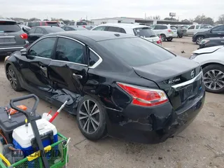 2014 Nissan Altima SL with VIN 1N4AL3AP2EC413882, listed as a IAAI auction lot 41300919 with 173,645 mi miles and . Bid and sale history available at DreamBid. Image 3.