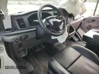2023 Ford Transit Cargo with VIN 1FTBR2C84PKB15484, listed as a Copart auction lot 50737605 with 15,881 mi miles and Salvage title. Bid and sale history available at DreamBid. Image 8.
