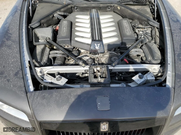 2014 Rolls-Royce Wraith with VIN SCA665C57EUX84259, listed as a Copart auction lot 65586204 with 52,048 mi miles and Salvage Title. Bid and sale history available at carsss.com. Image 12.
