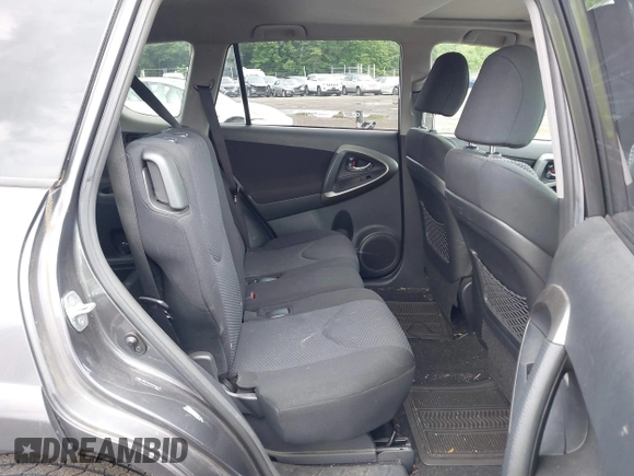 2012 Toyota RAV4 Sport with VIN JTMRF4DV5C5050774, listed as a IAAI auction lot 42662297 with 189,236 mi miles and . Bid and sale history available at DreamBid. Image 8.