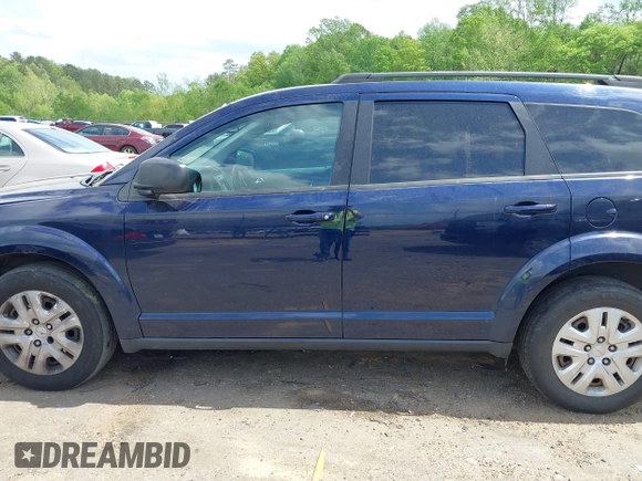 2018 Dodge Journey SE with VIN 3C4PDCAB7JT519491, listed as a IAAI auction lot 41974735 with 135,072 mi miles and . Bid and sale history available at DreamBid. Image 14.