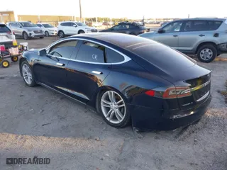 2013 Tesla Model S with VIN 5YJSA1DN9DFP06165, listed as a IAAI auction lot 40920844 with 181,342 mi miles. Bid and sale history available at carsss.com. Image 3.