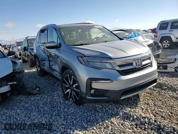 2020 Honda Pilot Touring 8-Passenger with VIN 5FNYF6H9XLB042625, listed as a Copart auction lot 86412804 with 52,061 mi miles and Salvage Title. Bid and sale history available at DreamBid. Image 11.