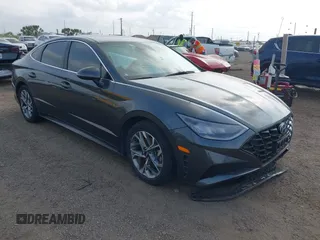 2023 Hyundai Sonata SEL z VIN KMHL64JA3PA277879, wystawiony jako IAAI lot #42001681 z przebiegiem 27 989 mil mil oraz . Historia ofert i sprzedaży dostępna na DreamBid. Obrazek 1.