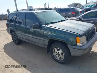 1994 Jeep Grand Cherokee Laredo with VIN 1J4GZ58S0RC266616, listed as a IAAI auction lot 41890812 with 190,000 mi miles. Bid and sale history available at carsss.com. Image 1.