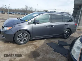 2016 Honda Odyssey Touring Elite z VIN 5FNRL5H99GB072860, wystawiony jako IAAI lot #42157603 z przebiegiem 221 449 mil mil oraz . Historia ofert i sprzedaży dostępna na DreamBid. Obrazek 14.