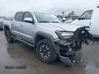 2016 Toyota Tacoma SR with VIN 3TMCZ5ANXGM010164, listed as a IAAI auction lot 41802736 with 201,697 mi miles. Bid and sale history available at carsss.com. Image 1.