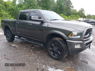 2018 Ram 2500 Laramie with VIN 3C6UR5FJ8JG211245, listed as a IAAI auction lot 42177342 with 58,260 mi miles and . Bid and sale history available at DreamBid. Image 1.
