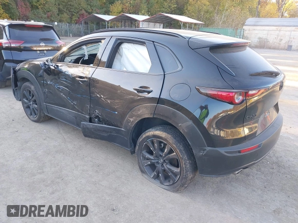 2023 Mazda CX-30 2.5 S Premium Package with VIN 3MVDMBDM5PM536219, listed as a IAAI auction lot 40710444 with 16,863 mi miles. Bid and sale history available at carsss.com. Image 3.