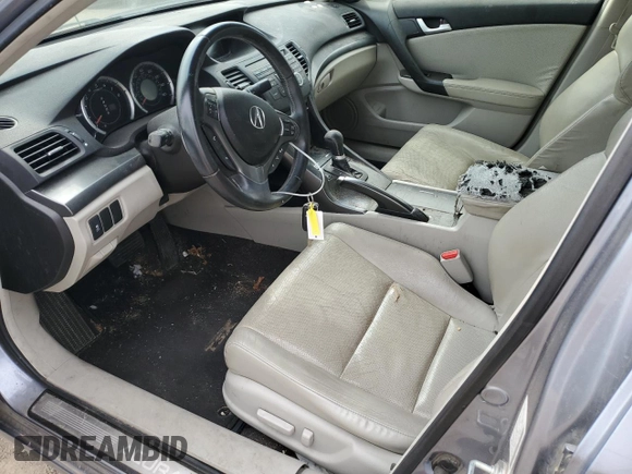 2012 Acura TSX Tech Pkg with VIN JH4CU2F62CC028957, listed as a Copart auction lot 50099255 with 129,410 mi miles and Salvage Title. Bid and sale history available at carsss.com. Image 7.