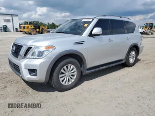 2019 Nissan Armada SL z VIN JN8AY2ND1K9091190, wystawiony jako Copart lot #60678005 z przebiegiem 126 654 mil mil oraz Czysty tytuł • Clean title. Historia ofert i sprzedaży dostępna na DreamBid. Obrazek 1.