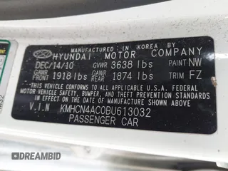 2011 Hyundai Accent GLS with VIN KMHCN4AC0BU613032, listed as a IAAI auction lot 42089042 with 132,518 mi miles. Bid and sale history available at carsss.com. Image 9.