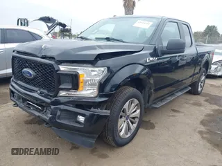 2018 Ford F-150 XL with VIN 1FTEX1EP6JKF59667, listed as a IAAI auction lot 42410311 with 134,385 mi miles and . Bid and sale history available at DreamBid. Image 2.