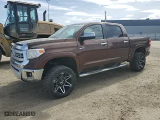 2015 Toyota Tundra 4WD Truck Platinum with VIN 5TFAY5F14FX438207, listed as a Copart auction lot 52706155 with 156,683 mi miles and Clean Title. Bid and sale history available at carsss.com. Image 1.