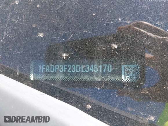 2013 Ford Focus SE with VIN 1FADP3F23DL345170, listed as a IAAI auction lot 41707454 with 140,334 mi miles and . Bid and sale history available at DreamBid. Image 9.