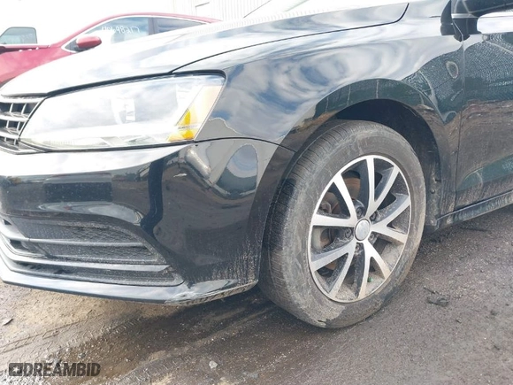2018 Volkswagen Jetta 1.4T SE with VIN 3VWDB7AJ8JM240887, listed as a IAAI auction lot 40657661 with 76,568 mi miles. Bid and sale history available at carsss.com. Image 6.