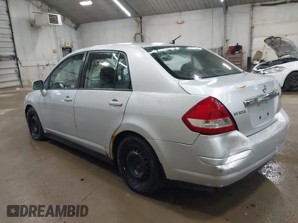 2011 Nissan Versa S with VIN 3N1BC1AP5BL465531, listed as a IAAI auction lot 42124083 with 249,641 mi miles and . Bid and sale history available at DreamBid. Image 3.
