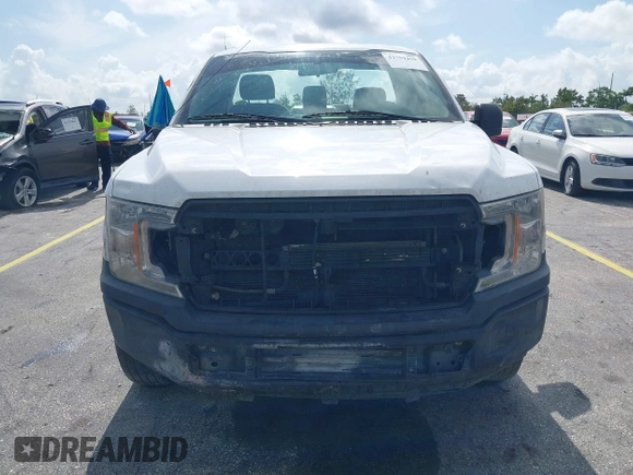 2018 Ford F-150 XL z VIN 1FTMF1CB4JKC60846, wystawiony jako IAAI lot #42759459 z przebiegiem 169 216 mil mil oraz . Historia ofert i sprzedaży dostępna na DreamBid. Obrazek 6.