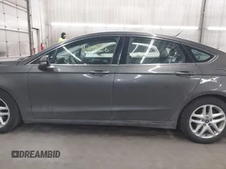 2015 Ford Fusion SE z VIN 3FA6P0HD0FR132316, wystawiony jako IAAI lot #41770636 z przebiegiem 185 681 mil mil oraz . Historia ofert i sprzedaży dostępna na DreamBid. Obrazek 14.