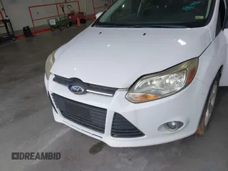 2012 Ford Focus SE with VIN 1FAHP3F23CL404590, listed as a IAAI auction lot 42671869 with 180,941 mi miles and . Bid and sale history available at DreamBid. Image 6.