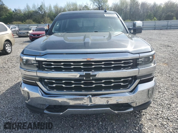 2017 Chevrolet Silverado 1500 LTZ with VIN 3GCUKSEJ9HG491930, listed as a Copart auction lot 51223025 with 128,251 mi miles and Salvage Title. Bid and sale history available at DreamBid. Image 5.