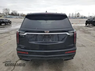 2020 Cadillac XT6 AWD Sport z VIN 1GYKPHRS2LZ129617, wystawiony jako Copart lot #87193304 z przebiegiem Nie podano mil oraz Szkoda całkowita • Salvage title. Historia ofert i sprzedaży dostępna na DreamBid. Obrazek 6.