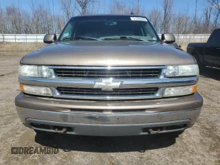 2003 Chevrolet Tahoe LT z VIN 1GNEK13Z43J136234, wystawiony jako Copart lot #51245445 z przebiegiem 227 769 mil mil oraz Czysty tytuł • Clean title. Historia ofert i sprzedaży dostępna na DreamBid. Obrazek 5.