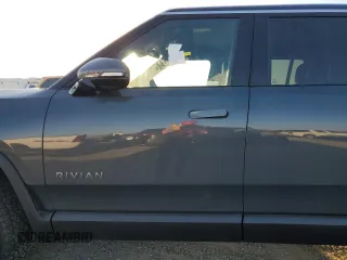 2025 Rivian R1S Adventure with VIN 7PDSGBBA6SN048784, listed as a Copart auction lot 42385665 with Not Provided miles and Salvage Title. Bid and sale history available at carsss.com. Image 7.