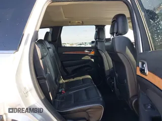 2013 Jeep Grand Cherokee Overland with VIN 1C4RJECG9DC545886, listed as a IAAI auction lot 41998913 with 166,077 mi miles. Bid and sale history available at carsss.com. Image 8.