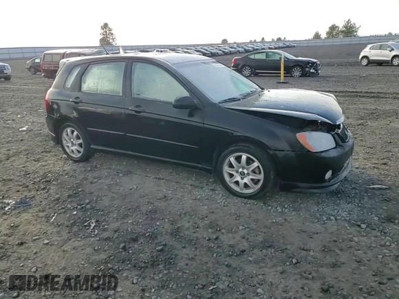 2005 Kia Spectra with VIN KNAFE161655093051, listed as a Copart auction lot 77821904 with 104,874 mi miles and Salvage Title. Bid and sale history available at carsss.com. Image 11.