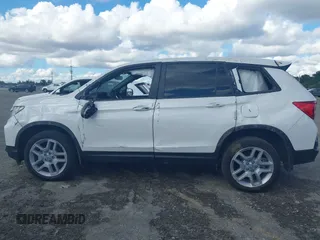 2025 Honda Passport EX-L z VIN 5FNYF8H52SB001266, wystawiony jako IAAI lot #41655256 z przebiegiem 5622 mil mil oraz . Historia ofert i sprzedaży dostępna na DreamBid. Obrazek 14.