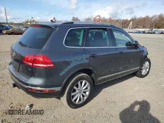 2015 Volkswagen Touareg Sport with VIN WVGEF9BP2FD002767, listed as a Copart auction lot 78127854 with Not provided miles and Salvage title. Bid and sale history available at DreamBid. Image 3.