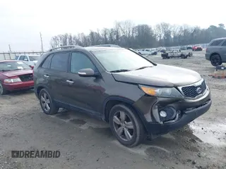 2012 Kia Sorento EX with VIN 5XYKU4A23CG302594, listed as a IAAI auction lot 41644499 with 173,355 mi miles. Bid and sale history available at carsss.com. Image 1.