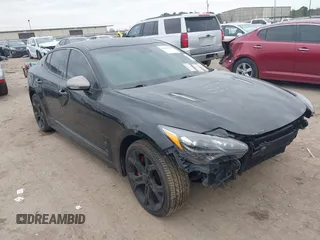2020 Kia Stinger GT with VIN KNAE35LC2L6078391, listed as a IAAI auction lot 41409482 with 63,146 mi miles. Bid and sale history available at carsss.com. Image 1.