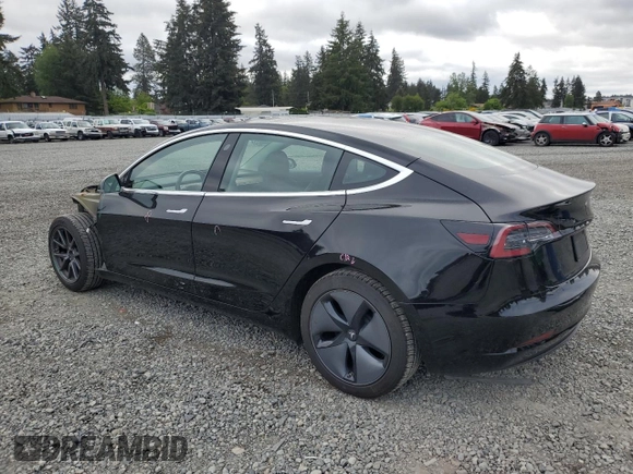 2019 Tesla Model 3 Mid Range z VIN 5YJ3E1EA2KF361787, wystawiony jako Copart lot #56059465 z przebiegiem 50 186 mil mil oraz Szkody całkowita. Historia ofert i sprzedaży dostępna na DreamBid. Obrazek 2.