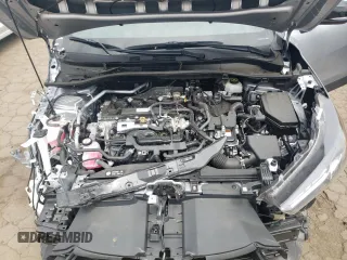 2024 Toyota Corolla Cross Hybrid S z VIN 7MUFBABG5RV034536, wystawiony jako Copart lot #56297535 z przebiegiem 26 655 mil mil oraz Szkoda całkowita • Salvage title. Historia ofert i sprzedaży dostępna na DreamBid. Obrazek 11.