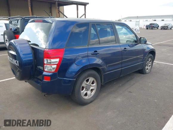 2010 Suzuki Grand Vitara Premium z VIN JS3TE0D27A4100764, wystawiony jako IAAI lot #41949104 z przebiegiem 144 684 mil mil oraz . Historia ofert i sprzedaży dostępna na DreamBid. Obrazek 4.