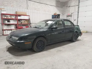 1999 Saturn SL with VIN 1G8ZK5279XZ303366, listed as a IAAI auction lot 42510468 with 125,860 mi miles and . Bid and sale history available at DreamBid. Image 2.