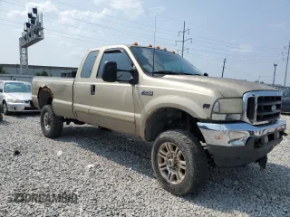 2001 Ford Super Duty F-250 XL with VIN 1FTNX21S31EA51607, listed as a Copart auction lot 64711164 with 137,934 mi miles and Salvage Title. Bid and sale history available at carsss.com. Image 4.