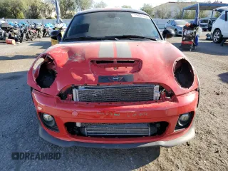 2015 MINI Coupe S z VIN WMWSX3C59FT409468, wystawiony jako Copart lot #71401384 z przebiegiem Nie podano mil oraz Szkody całkowita. Historia ofert i sprzedaży dostępna na DreamBid. Obrazek 5.
