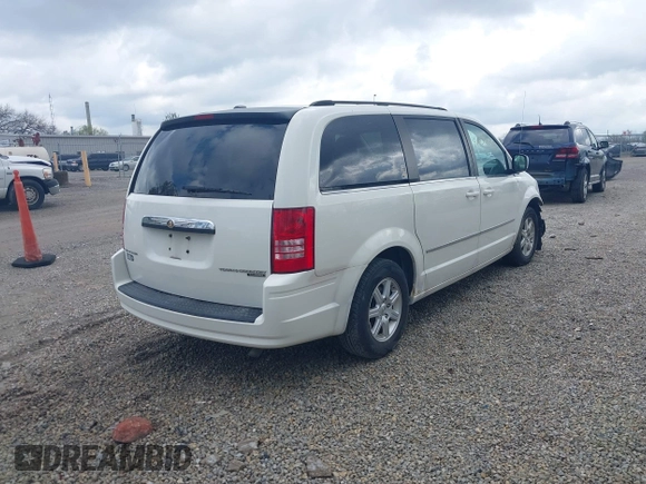 2010 Chrysler Town & Country Touring with VIN 2A4RR5D19AR432617, listed as a IAAI auction lot 42059653 with 189,582 mi miles. Bid and sale history available at carsss.com. Image 4.