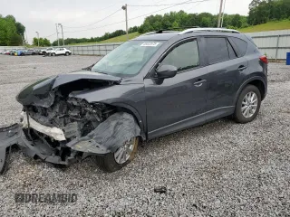 2016 Mazda CX-5 Touring с VIN JM3KE2CY7G0735440, выставлен на аукционе Copart как лот 55522075 с пробегом 148 962 миль миль и Списание • Salvage title. История ставок и продаж доступна на DreamBid. Изображение 1.