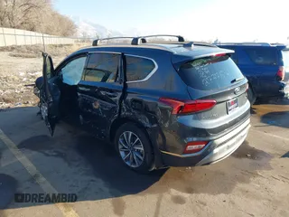 2020 Hyundai Santa Fe Limited with VIN 5NMS5CAD9LH273715, listed as a IAAI auction lot 41259190 with 14,669 mi miles and . Bid and sale history available at DreamBid. Image 3.