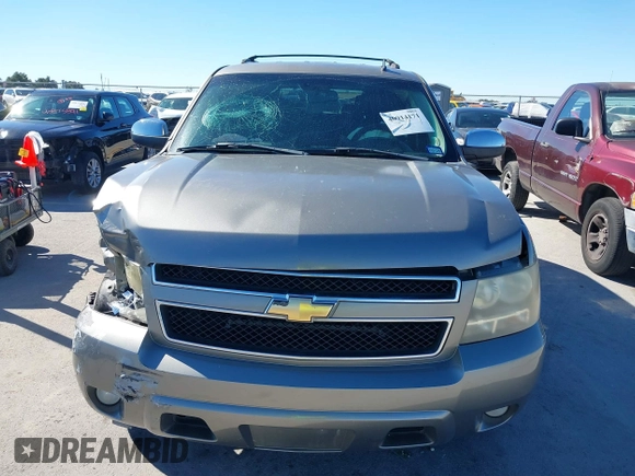 2007 Chevrolet Tahoe LTZ with VIN 1GNFC13J97R155705, listed as a IAAI auction lot 40914171 with 165,727 mi miles and . Bid and sale history available at DreamBid. Image 6.