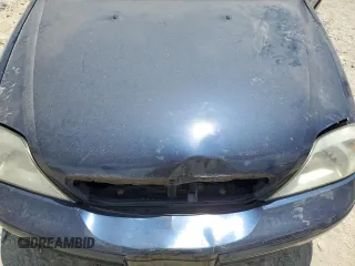 2001 Mercury Sable LS with VIN 1MEHM55SX1G642764, listed as a Copart auction lot 62508394 with 79,074 mi miles and Salvage Title. Bid and sale history available at DreamBid. Image 11.