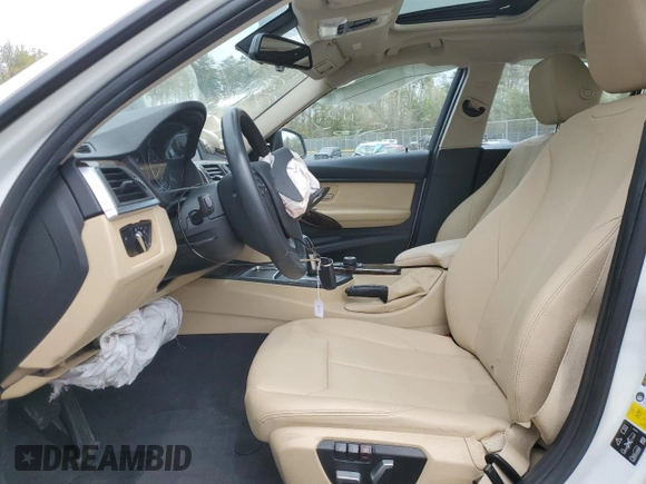 2017 BMW 3 Series 320i xDrive with VIN WBA8E5G5XHNU22436, listed as a Copart auction lot 52702805 with 74,008 mi miles and Salvage title. Bid and sale history available at DreamBid. Image 7.