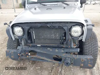 2018 Jeep Wrangler Unlimited Sahara with VIN 1C4BJWEGXJL806832, listed as a IAAI auction lot 42605892 with 90,535 mi miles and . Bid and sale history available at DreamBid. Image 6.
