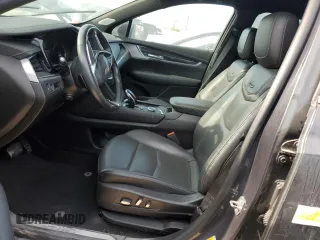 2023 Cadillac XT5 FWD Premium Luxury z VIN 1GYKNCRS0PZ173923, wystawiony jako Copart lot #52212695 z przebiegiem Nie podano mil oraz Szkoda całkowita • Salvage title. Historia ofert i sprzedaży dostępna na DreamBid. Obrazek 7.