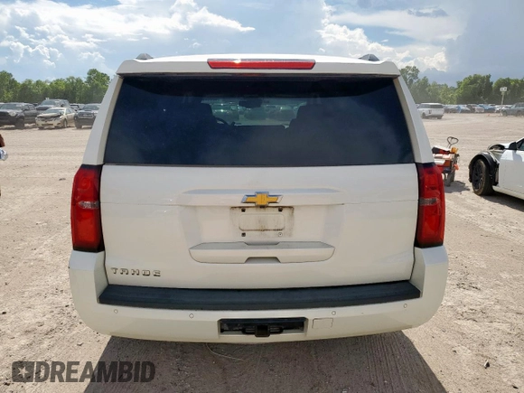 2015 Chevrolet Tahoe LT with VIN 1GNSCBKC5FR302611, listed as a Copart auction lot 62068165 with 184,136 mi miles and Salvage title. Bid and sale history available at DreamBid. Image 6.