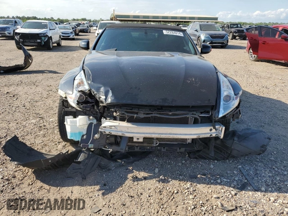2014 Nissan 370Z Touring with VIN JN1AZ4FH3EM621279, listed as a Copart auction lot 52284814 with 60,479 mi miles and Salvage Title. Bid and sale history available at DreamBid. Image 5.